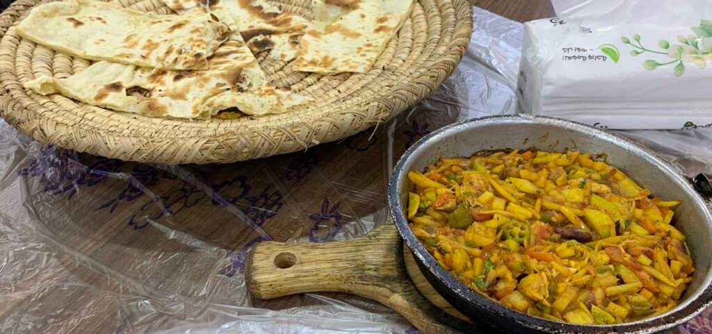 Budget Itinerary for Saudi Arabia.  Tissue; Bread on a basket; and Shabani Oqda Chicken