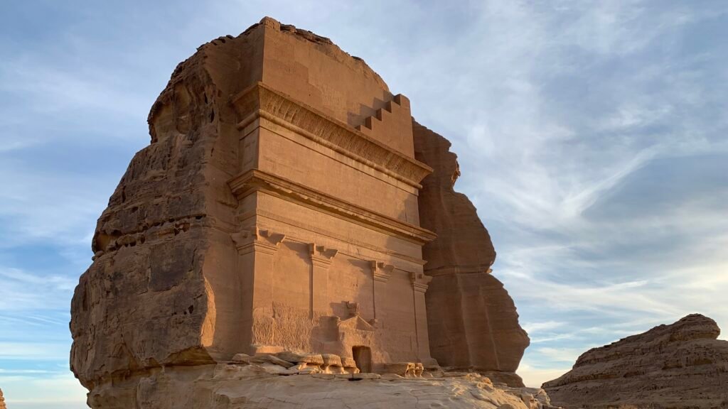 Budget Itinerary for Saudi Arabia. Hegra: Unfinished tomb of Lihyan, son of Kuza; VIew from North at Sunset in Winter