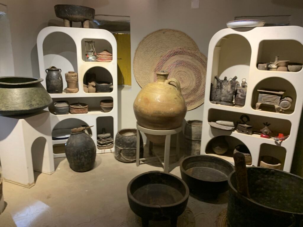 Cooking ware on display inside the Rijal Alma'a Museum