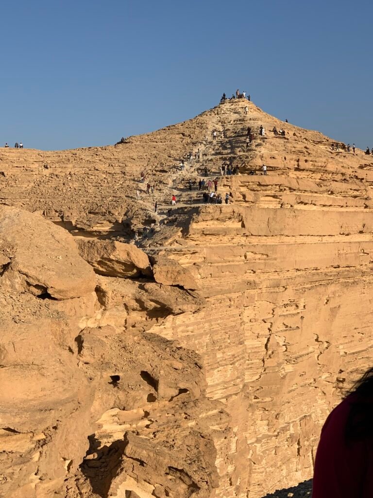 It certainly looks quite daunting to stand by the cliff edge but it is safer than it looks.