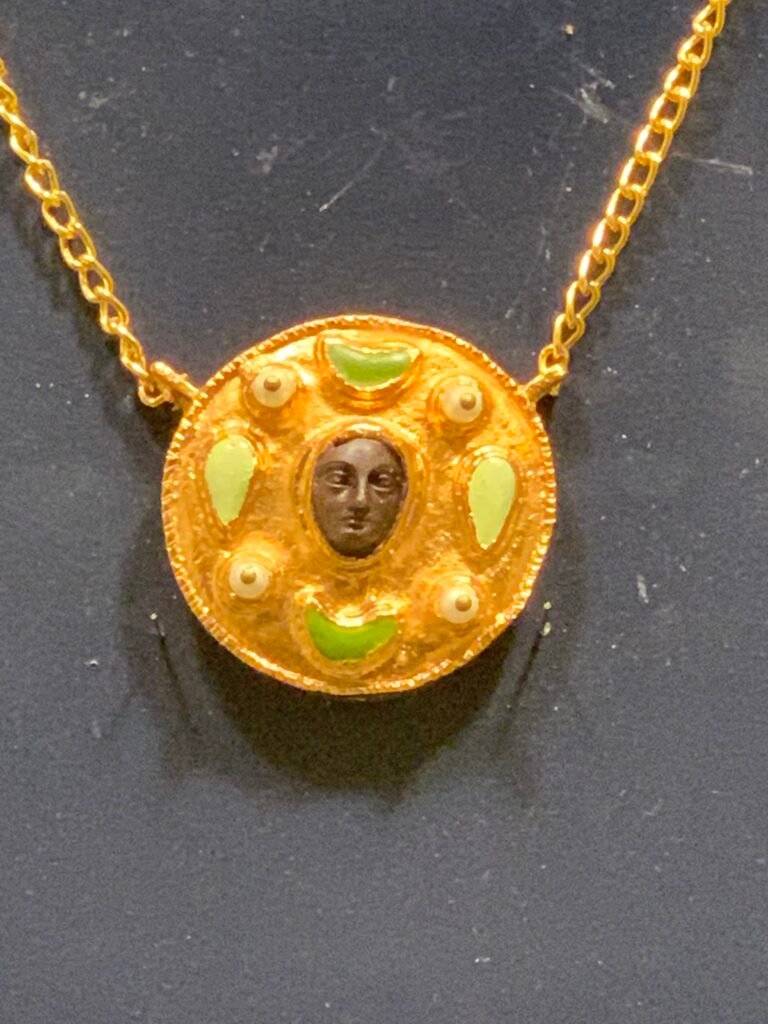 16Days Saudi Arabia Itinerary. Exhibit of a pendant at the National Museum