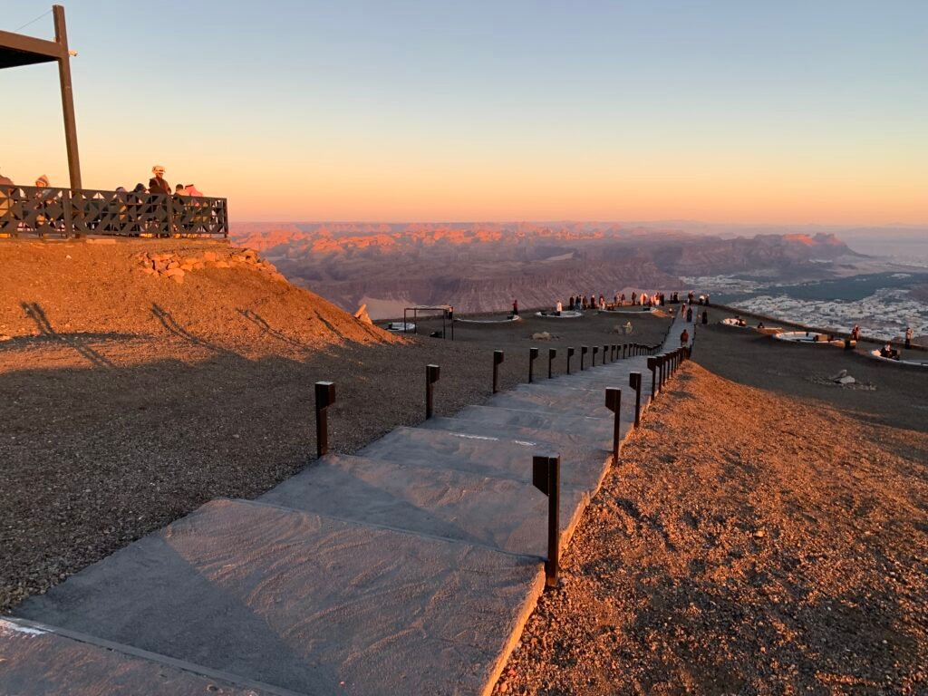 16days Saudi Arabia Itinerary. View at the top at Harrat Viewpoint where a portion of the canyons are already in the shadows.