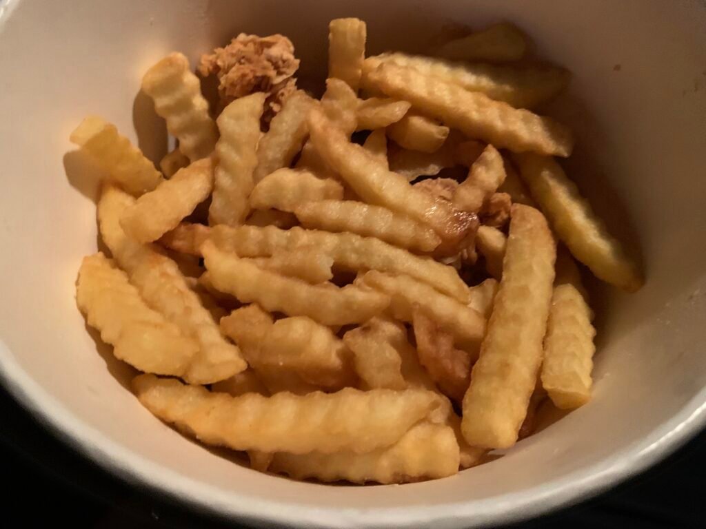 the sultanate of oman. 8-piece fried chicken with fries for OMR2.50