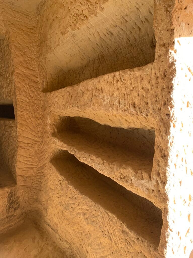 16days Saudi Arabia Itinerary. Slots in the wall were bodies were excavated.