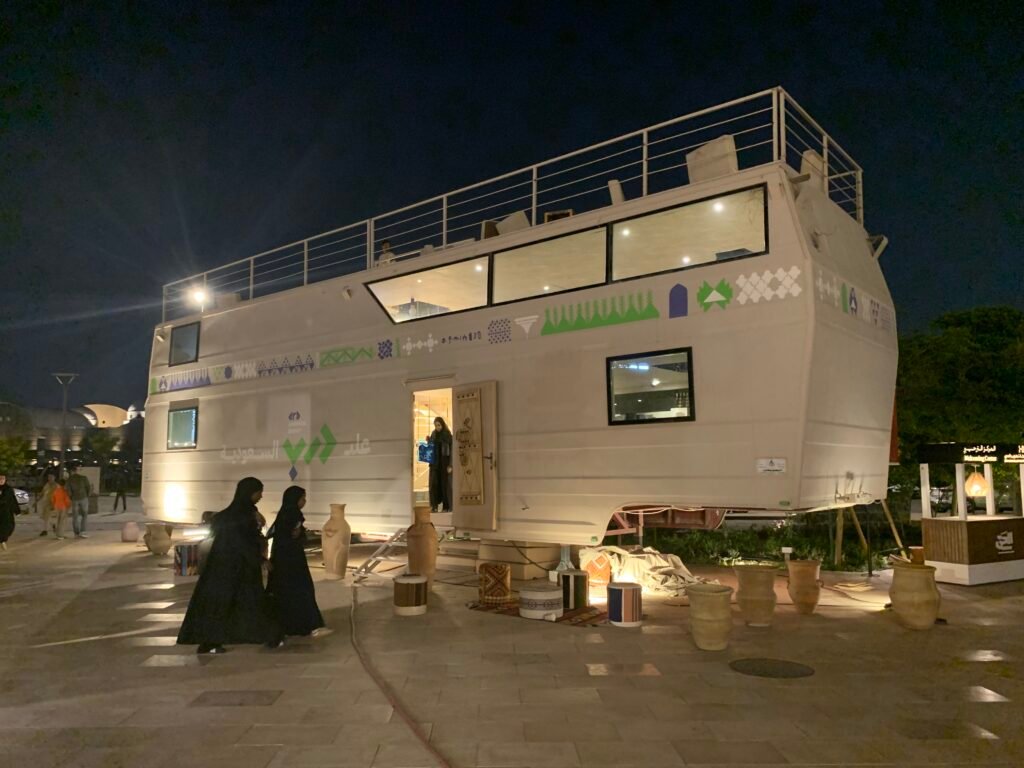 The triple deck bus store and cafe at Hayy in Madinah.