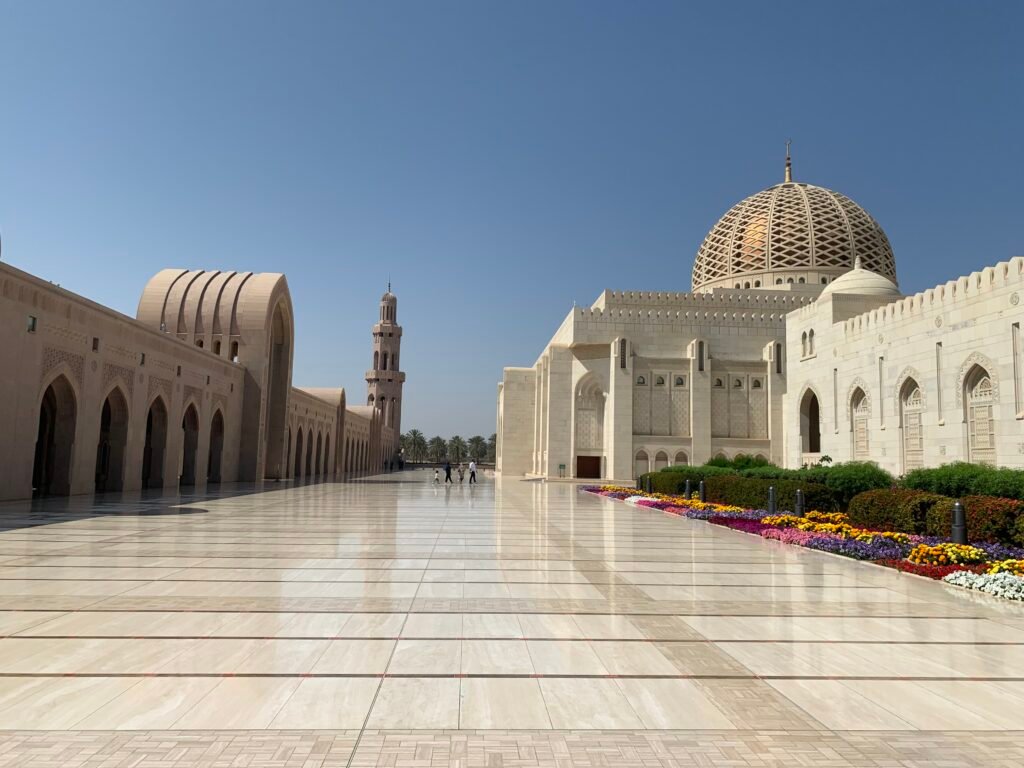 10 best things to do in Oman for free. The pristine grounds of the Sultan Qaboos Grand Mosque.