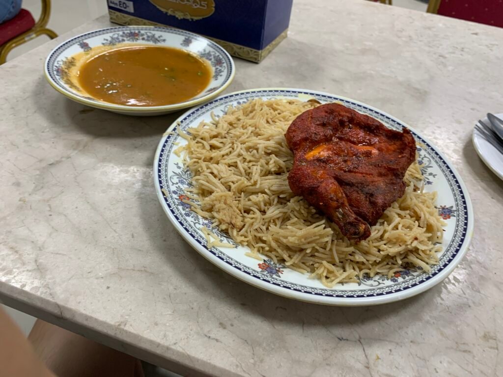 what I ate in Oman. OMR1 for Chicken Palao and the size of the chicken portion is respectable.