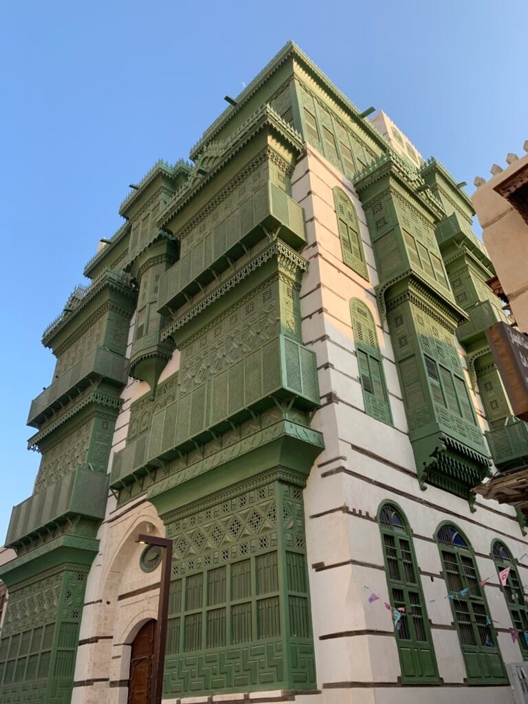 Green windows and balconies make this block a very distinctive landmark in the entire district.