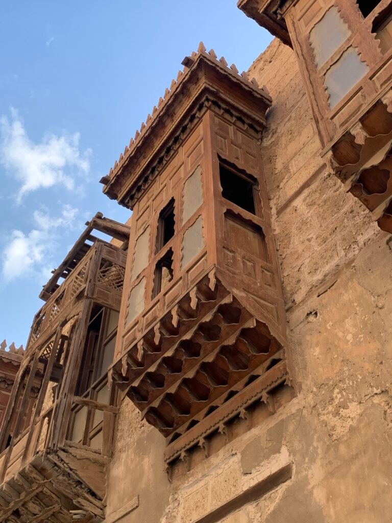Ornate features of timber against the mudwalls at Al Balad district in Jeddah.