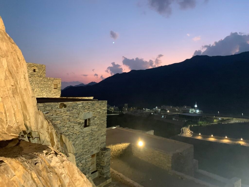 At about Halfway up to the top and looking back at last light at Thee Ain Heritage Village.